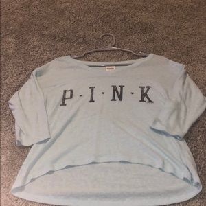 A Pink Brand Shirt.